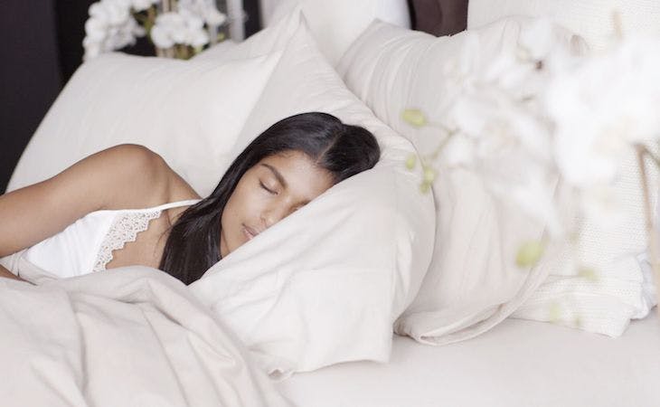 full size bed dimensions - person sleeping in full size bed
