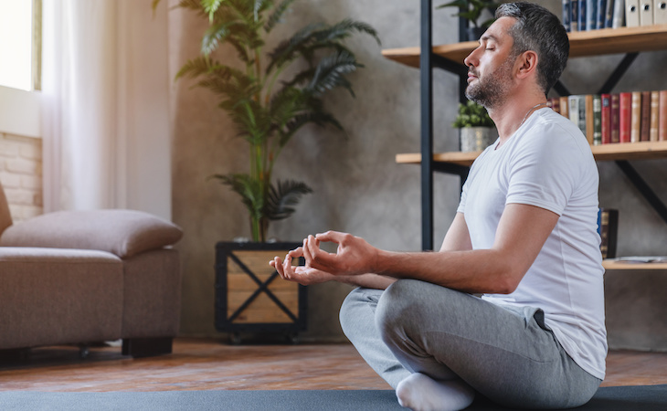 person practicing non-sleep deep rest meditation