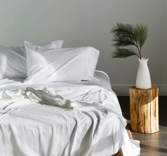 Saatva Signature Sateen Sheet Set Unmade Bed